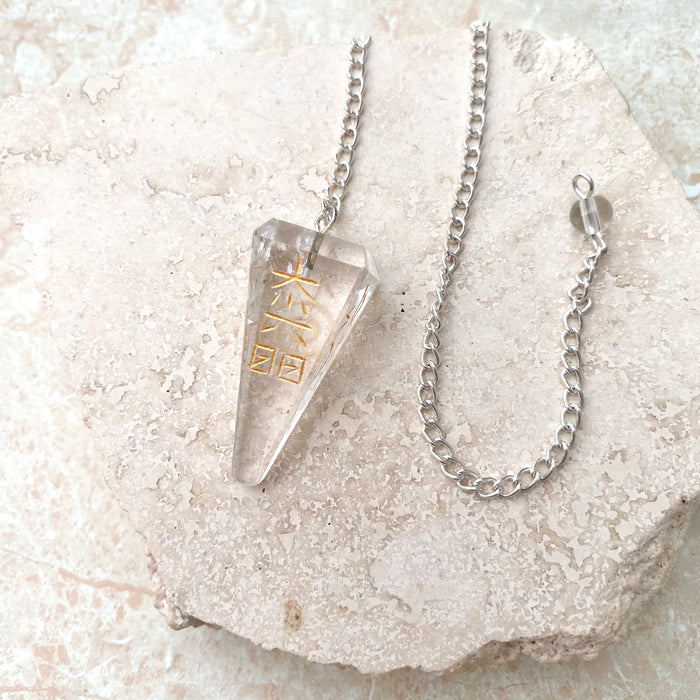 Clear Quartz Symbol Faceted Pendulum