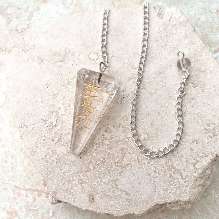 Clear Quartz Symbol Faceted Pendulum