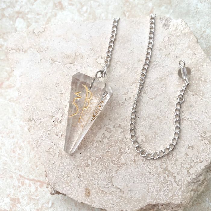 Clear Quartz Symbol Faceted Pendulum