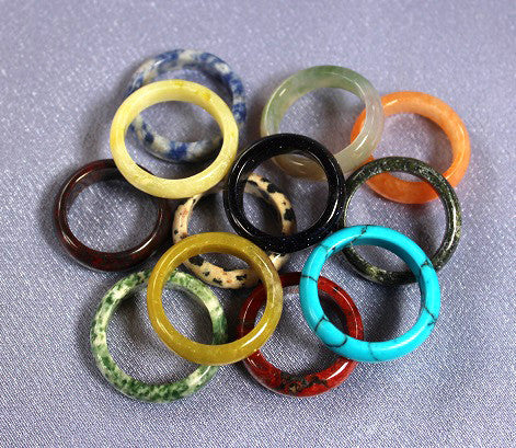 Carved top stone rings